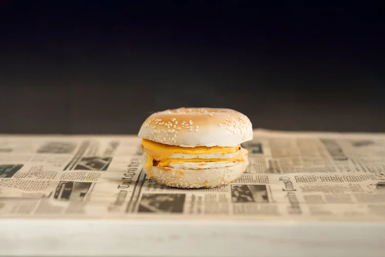 Egg and cheese bagel on sesame seed bagel at Monday Coffee Club Dearborn MI