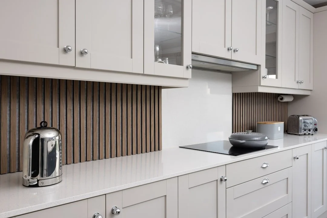 Professionally painted white kitchen cabinets by Hopewell Painting in North Georgia