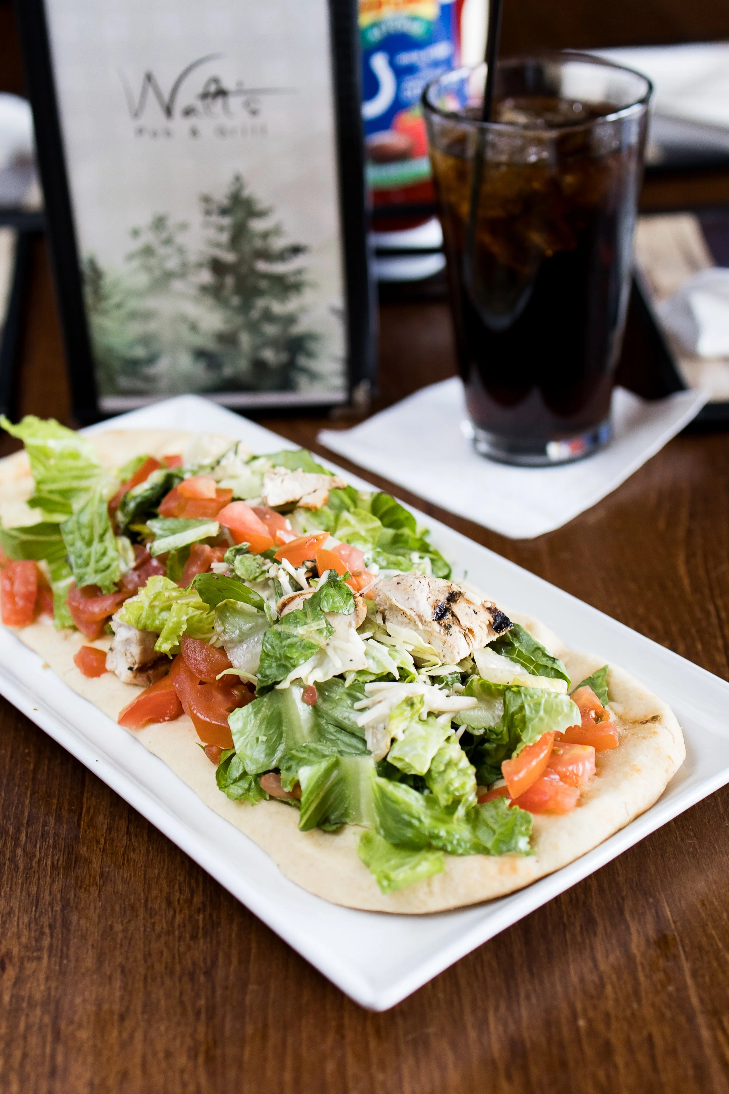 Meatlover's flatbread from Walt’s Pub & Grill in West Lafayette