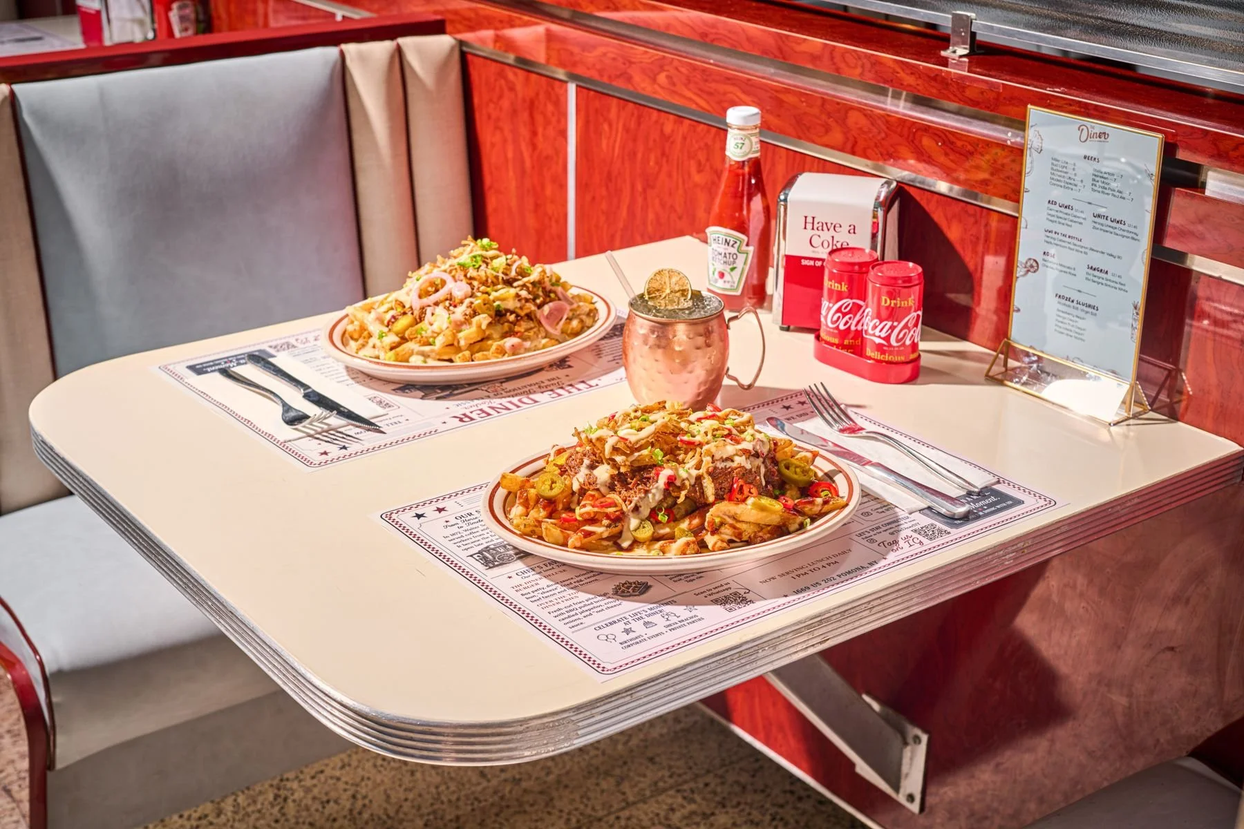 A booth set for dinner