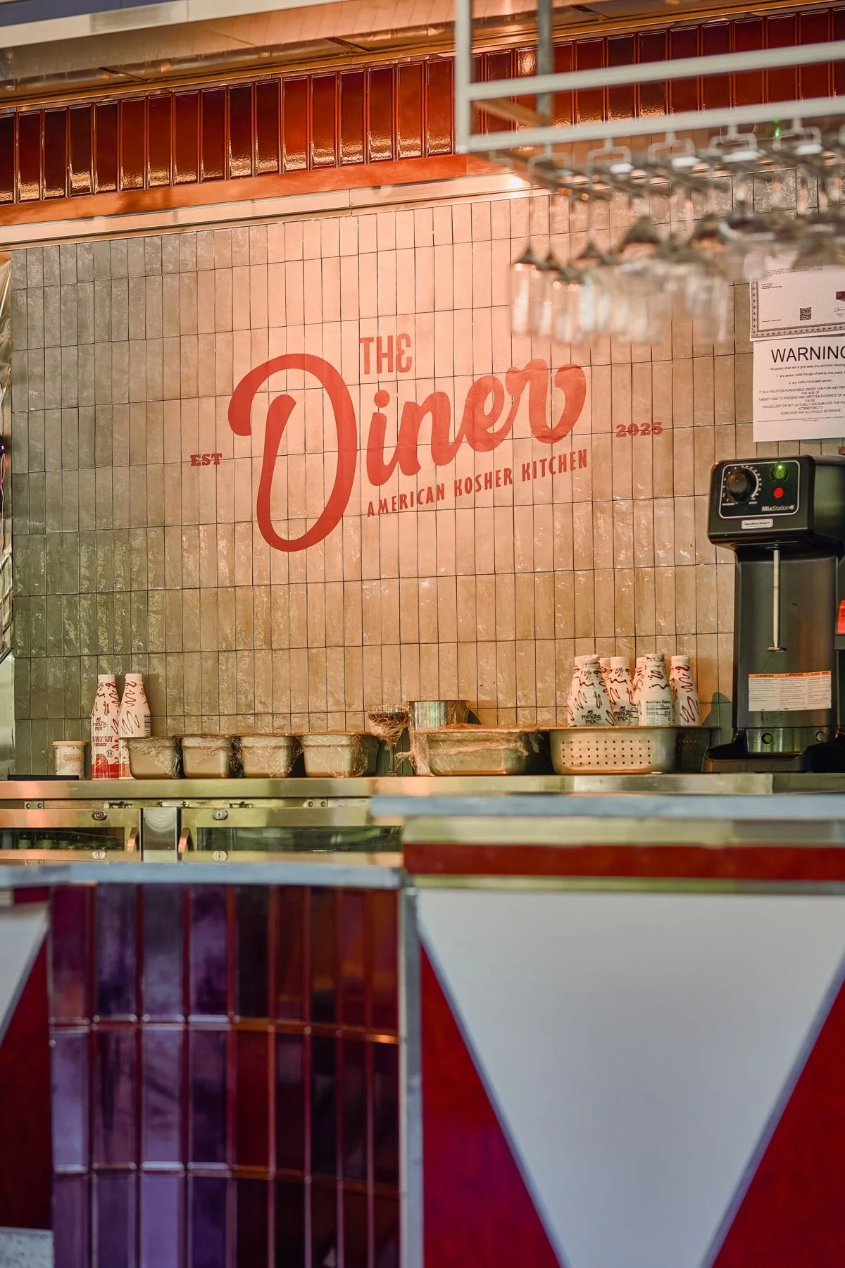 The Diner logo wall and counter