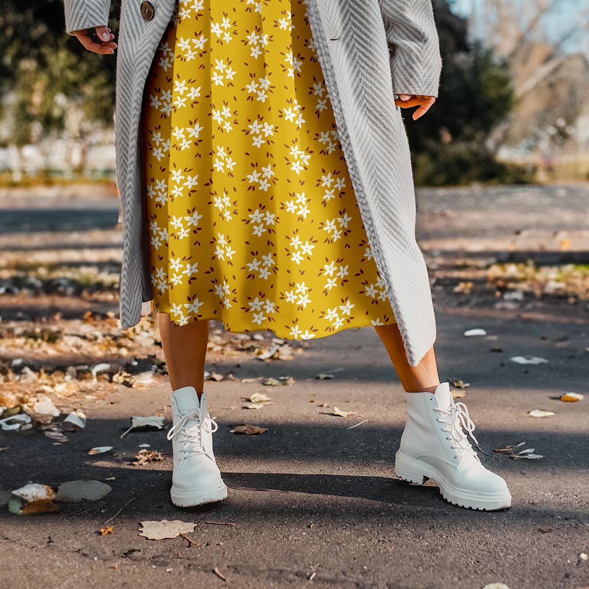 Yellow floral seamless pattern fabric featured on a dress, designed for apparel and cheerful summer and fall sewing projects.