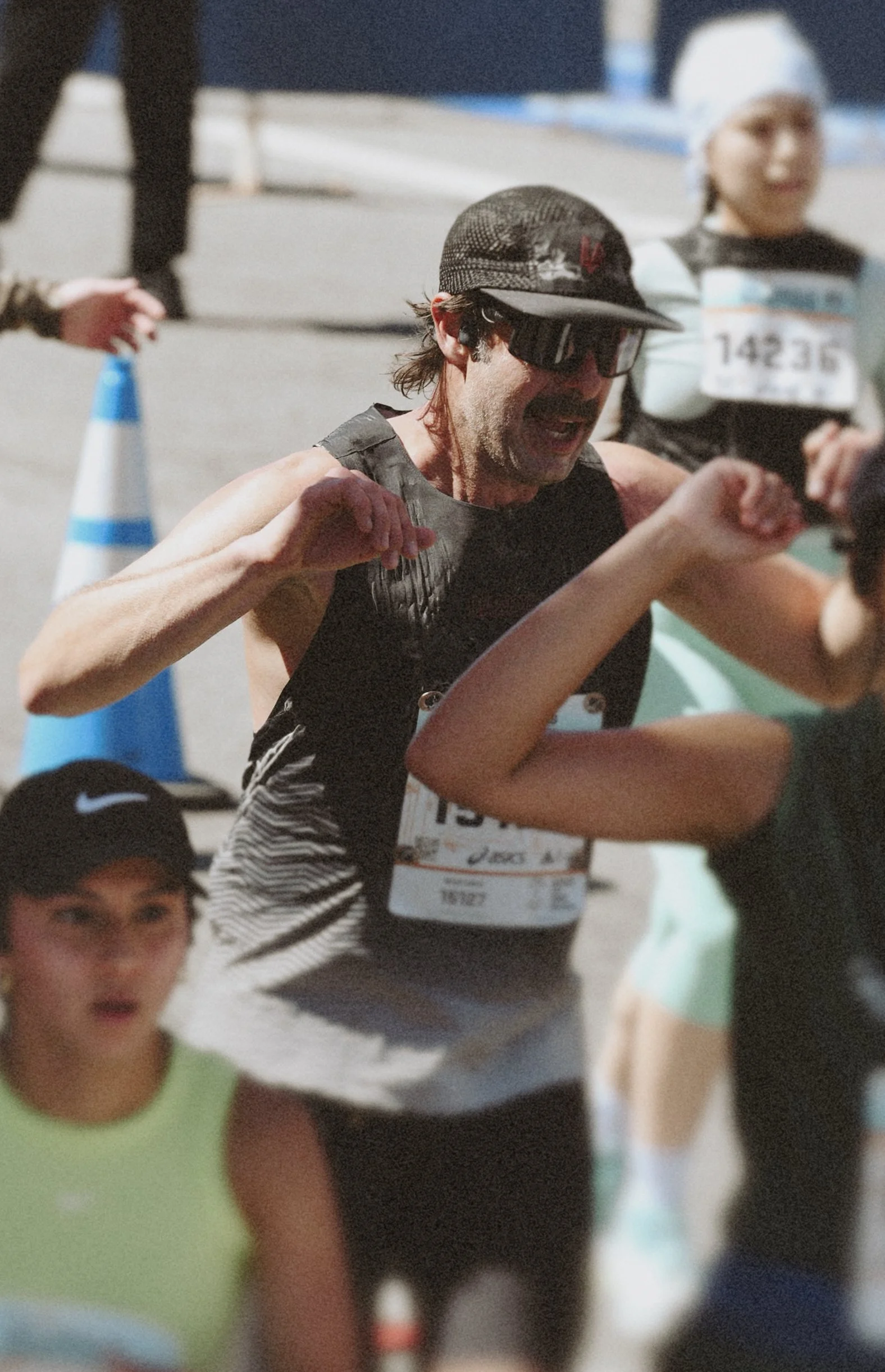 Alberto arms up at the finish