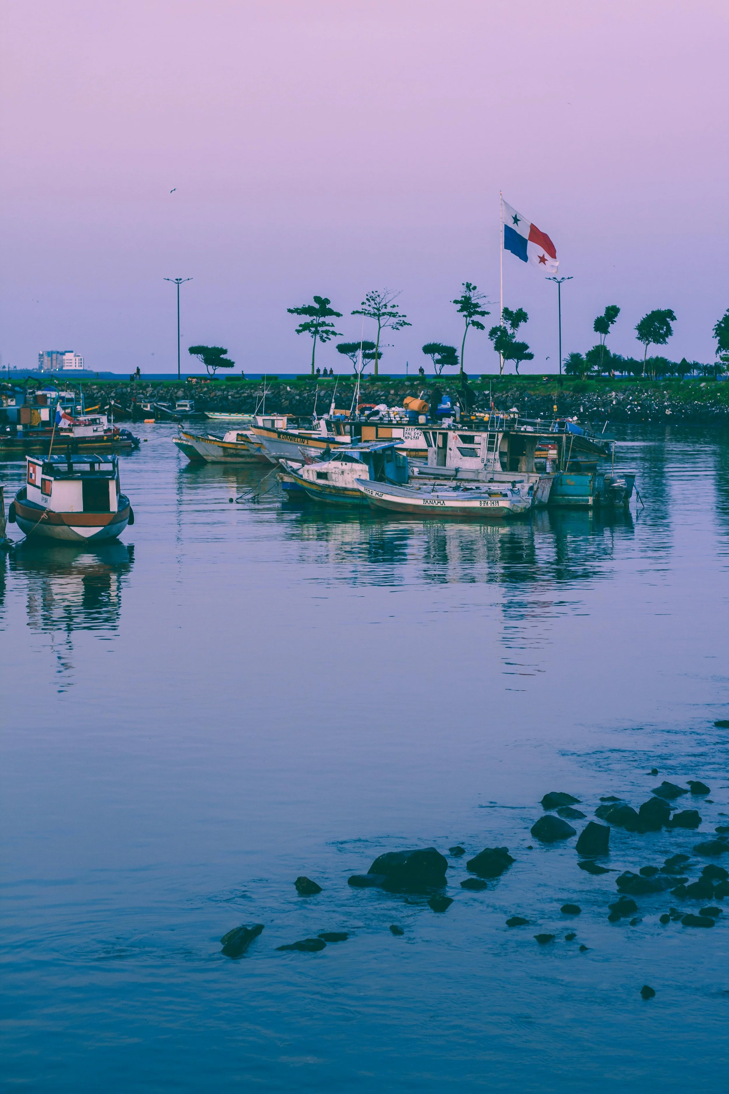Fishing boats at dusk, Panamanian flag