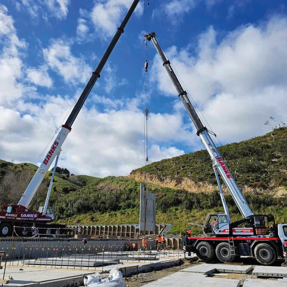 Banks crane lifting precast concrete panel