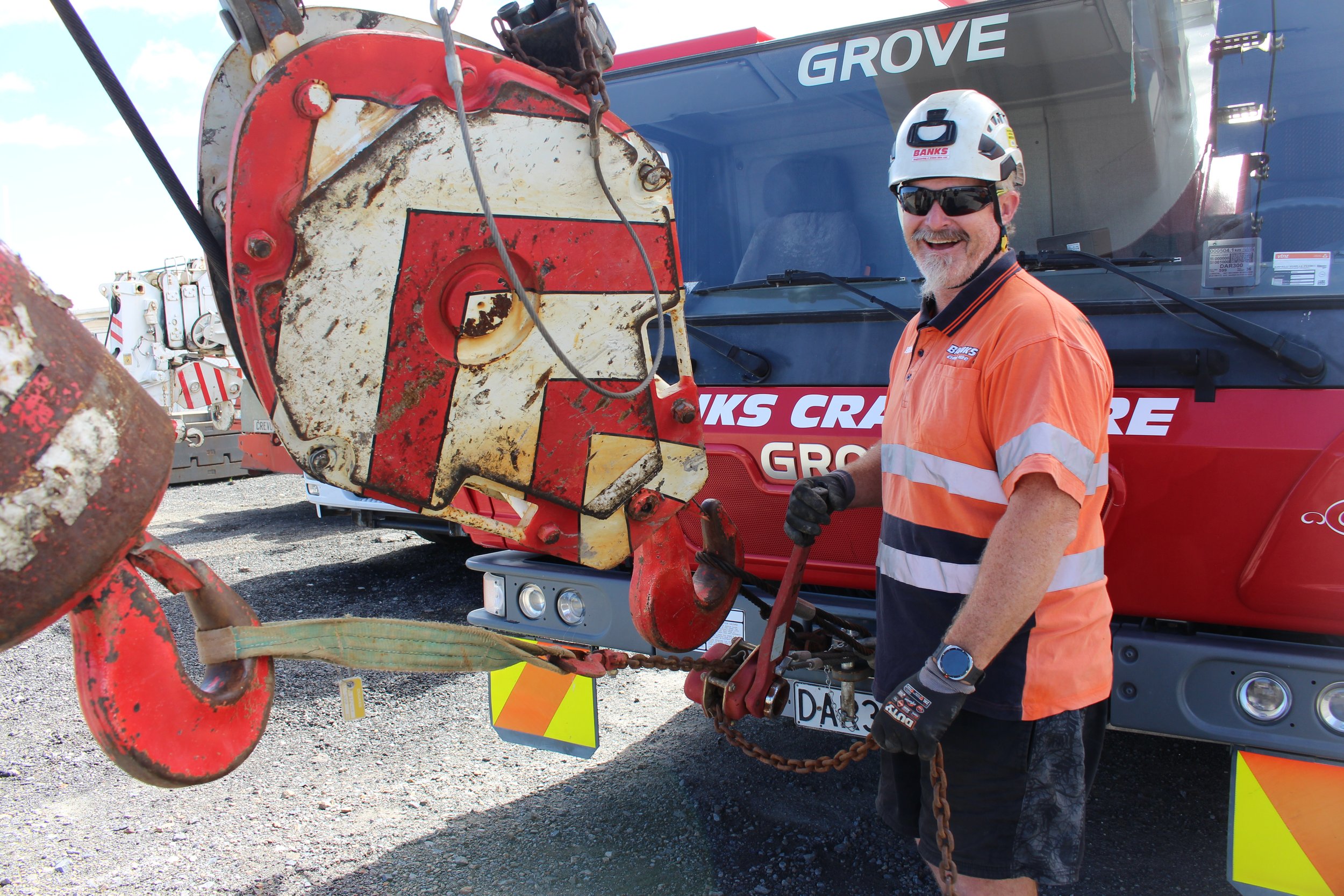 Banks Crane and Transport team member wearing site PPE