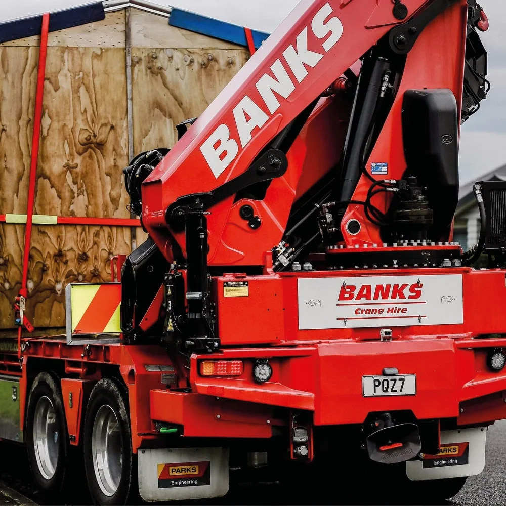 Banks Crane and Transport HIAB crane truck providing collection transport and final placement.