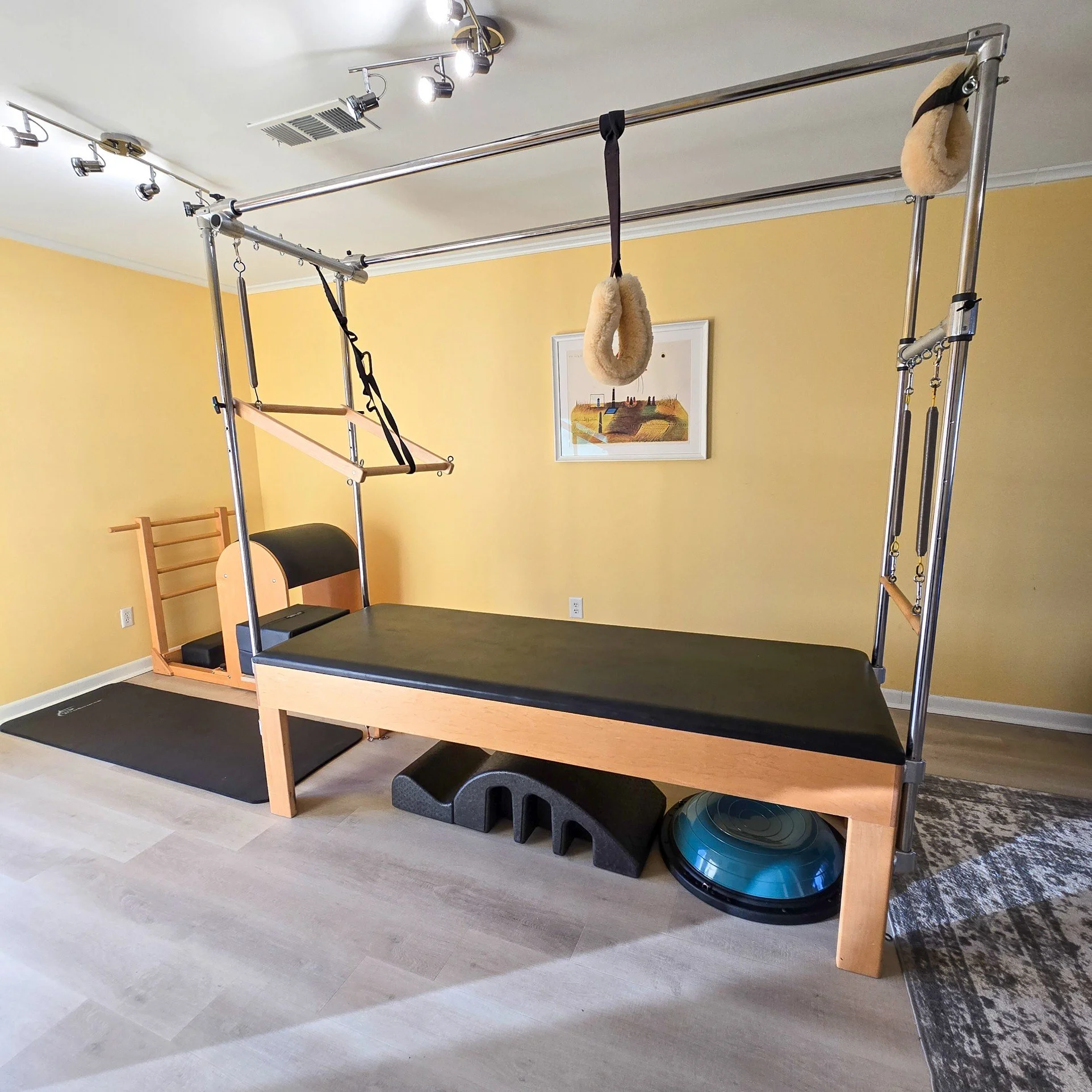 Pilates studio with Trapeze Table and equipment