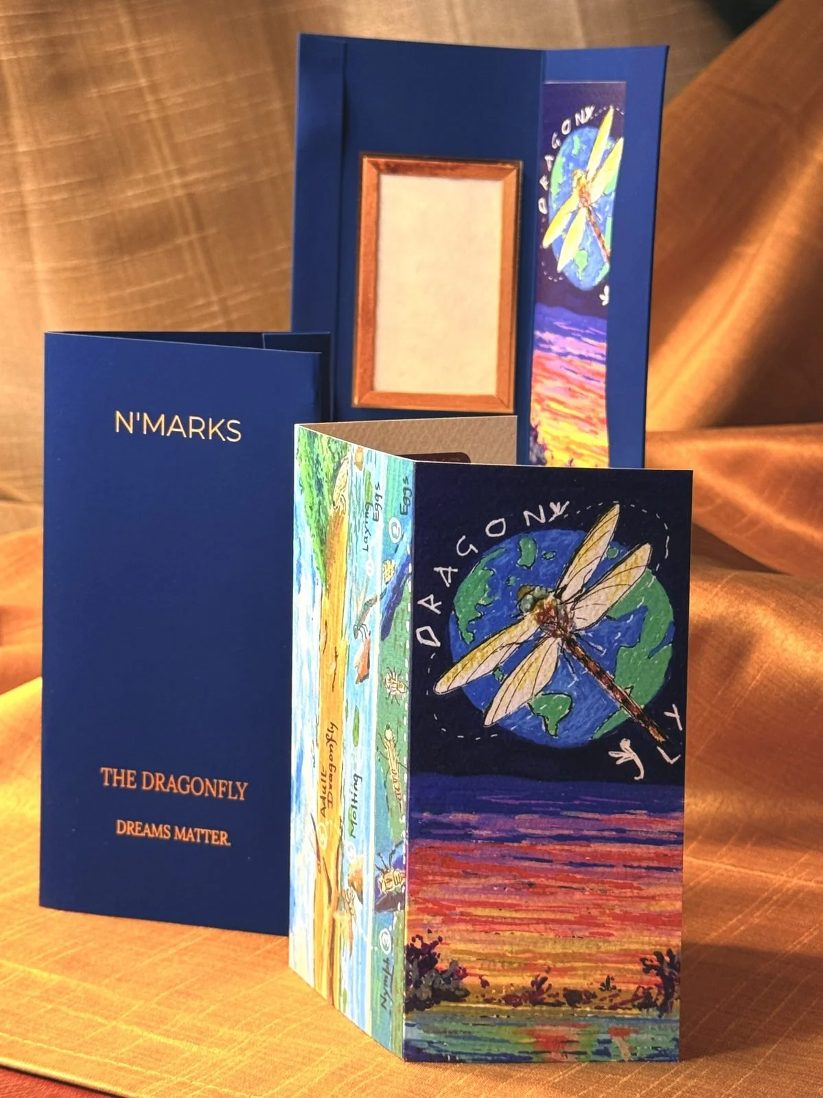 The Dragonfly Tesera, standing open