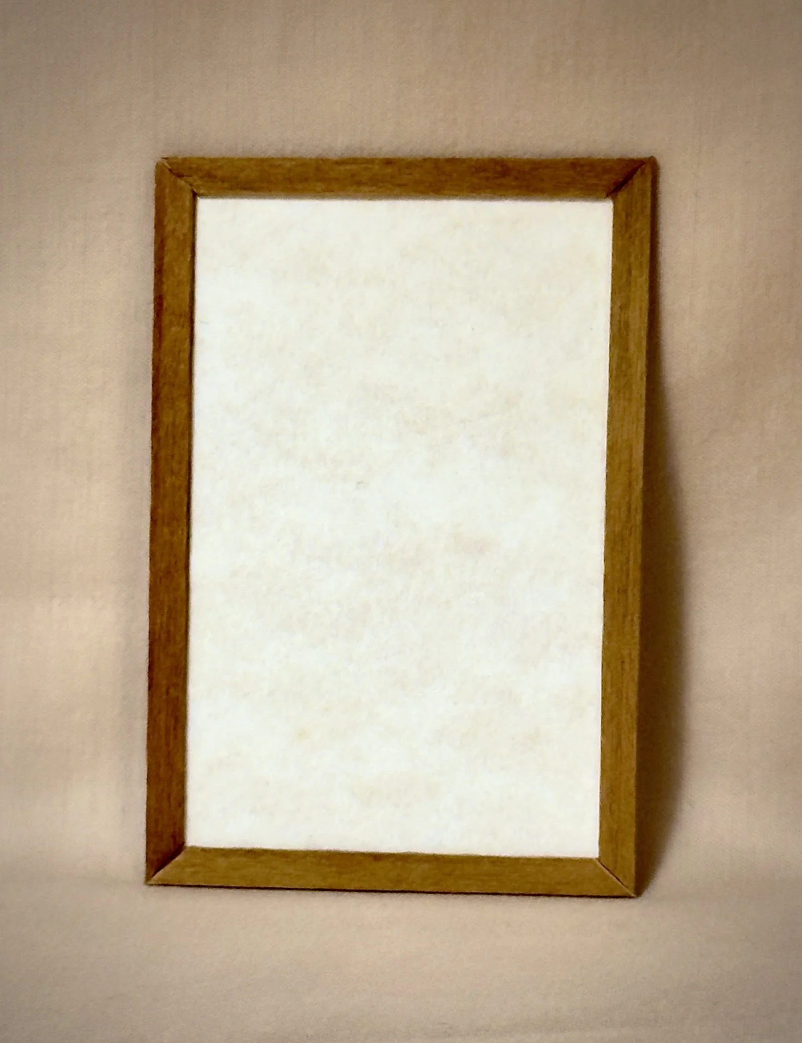 N'marks gift card — blank cream card in wooden frame, ready for your words
