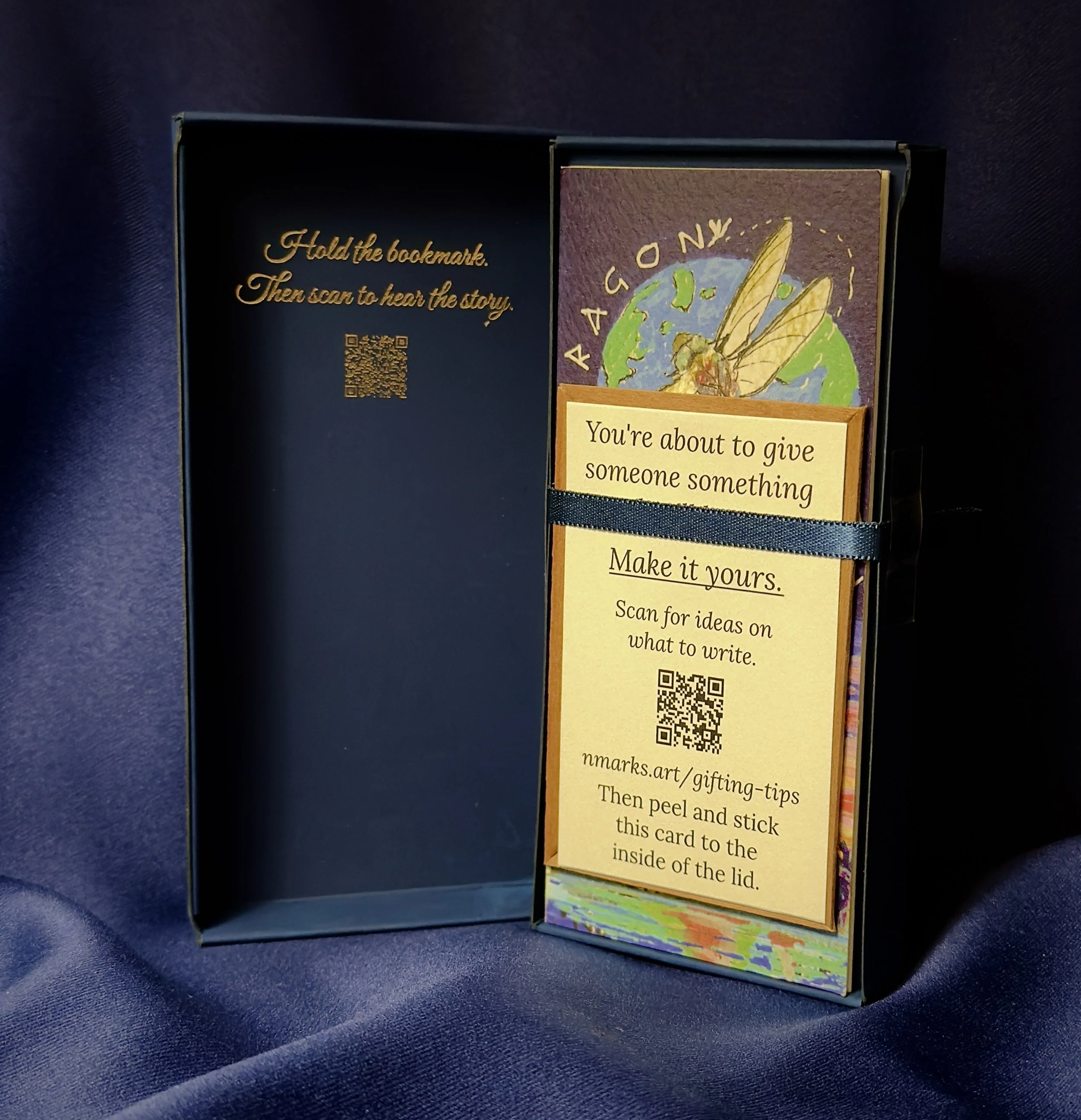 N'marks Dragonfly Bookmark box open — showing QR code lid, bookmark in tray, and gift card
