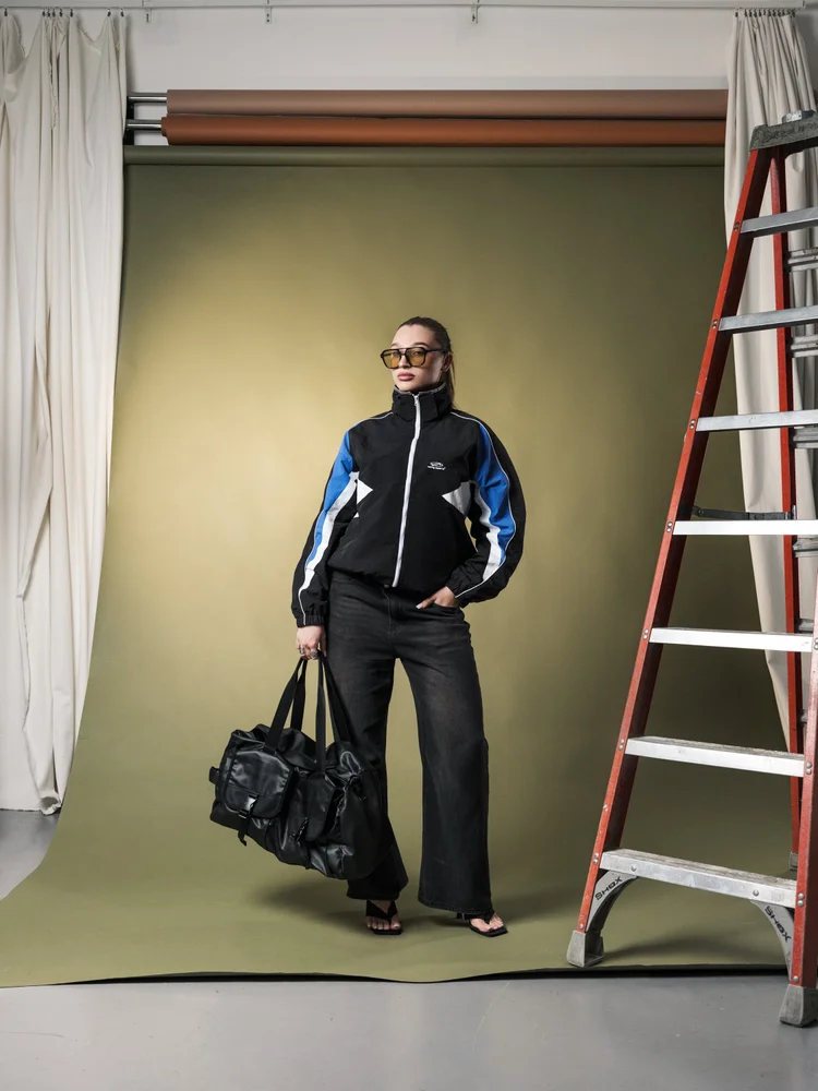 Vanity Apparel advertising portrait with black bag