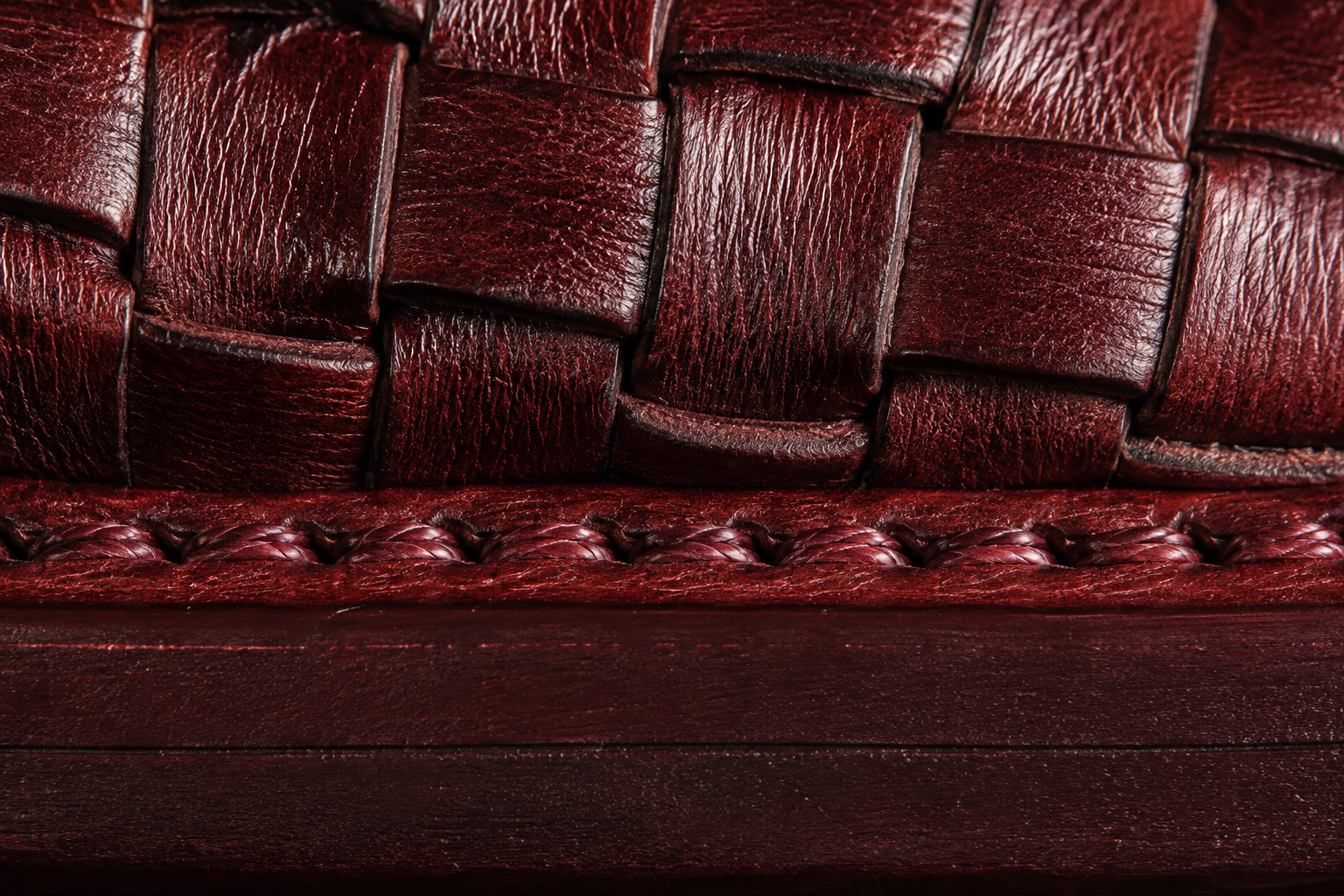 Twin tassels on woven burgundy throat macro