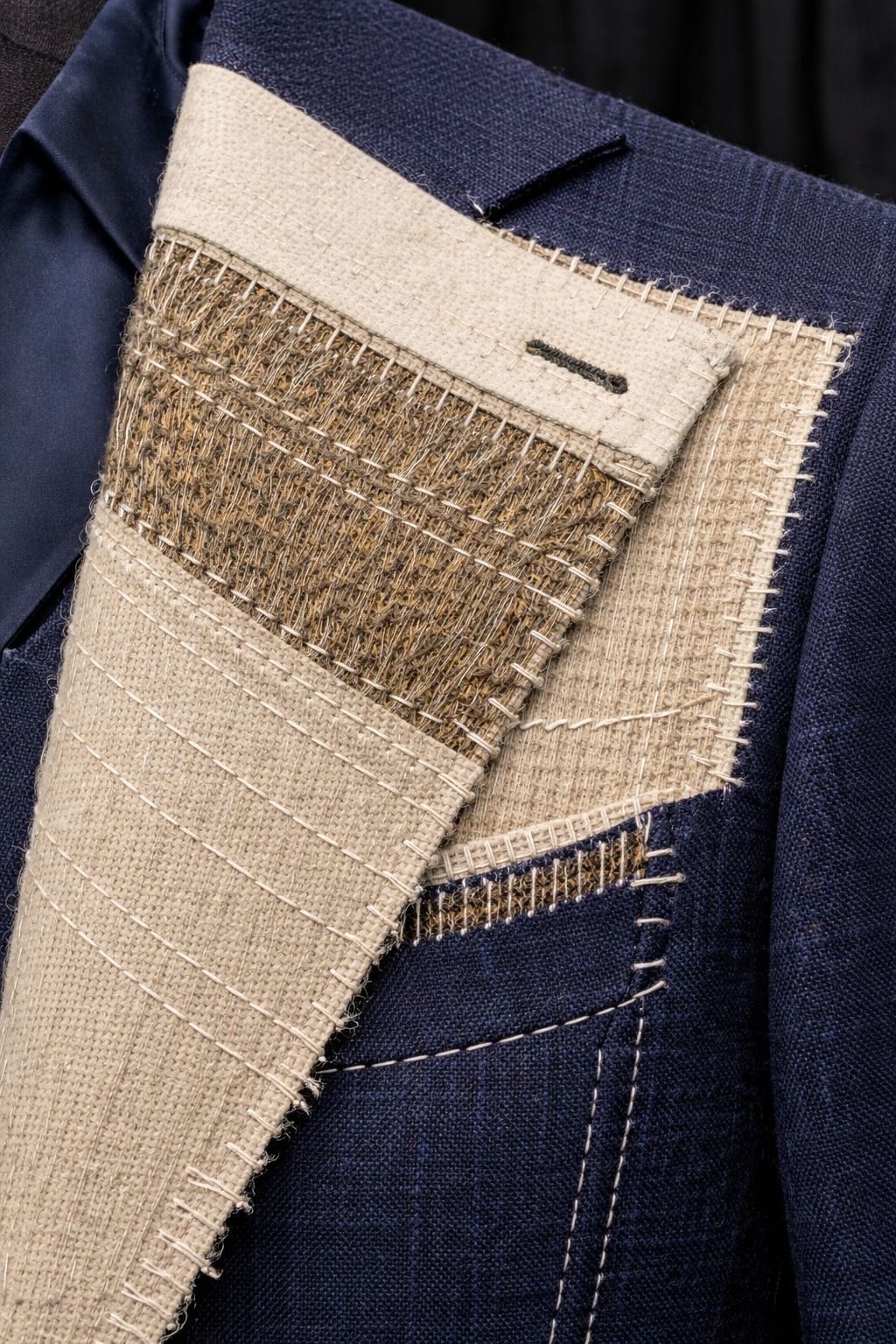 Half canvas suit construction with canvas in the chest and lapels and fused lower panels for a balanced fit