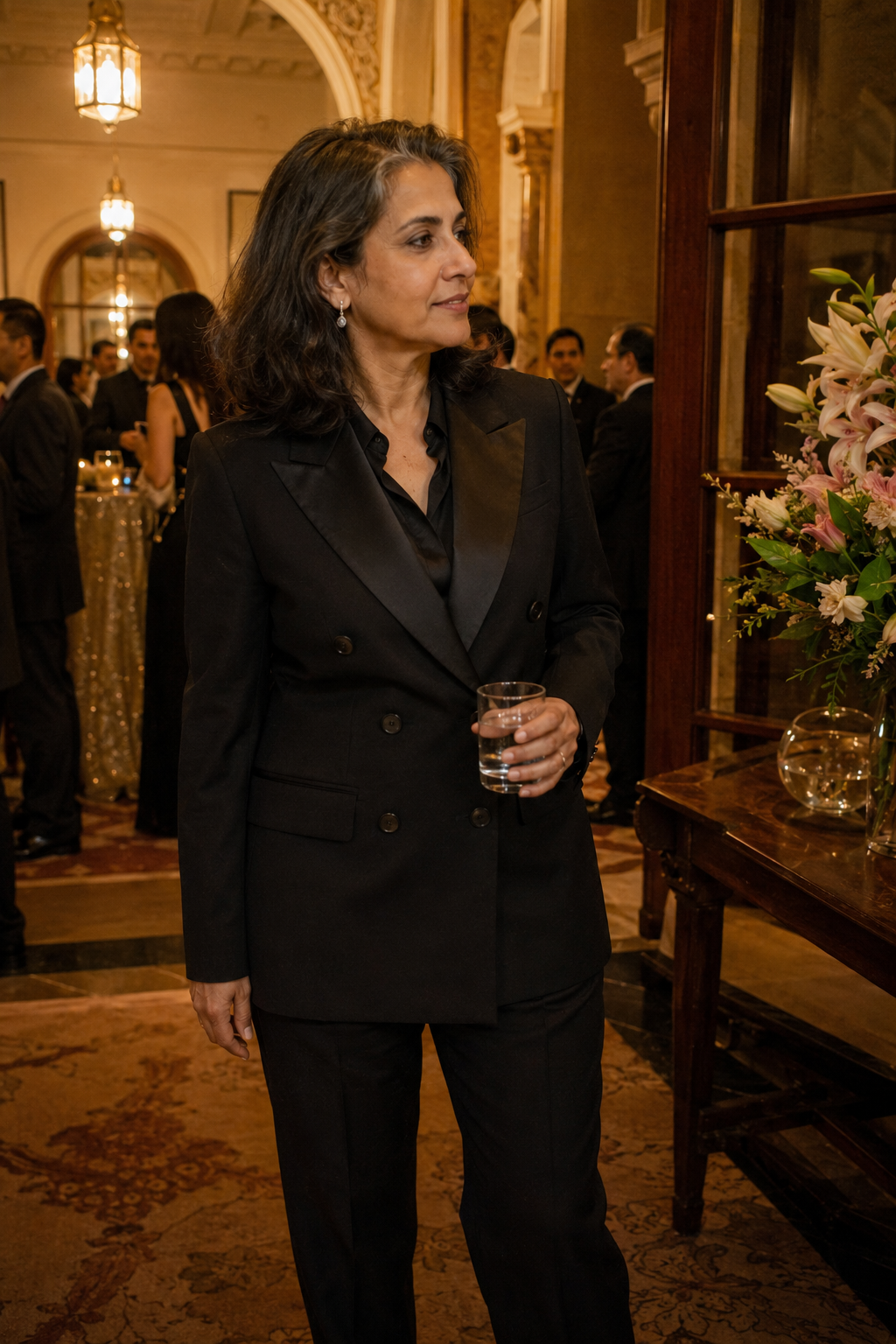 Woman's double-breasted bespoke suit, peak lapels