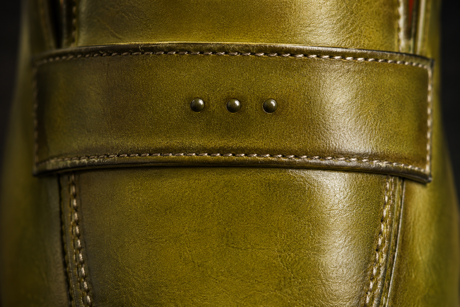 Three-stud saddle-strap macro