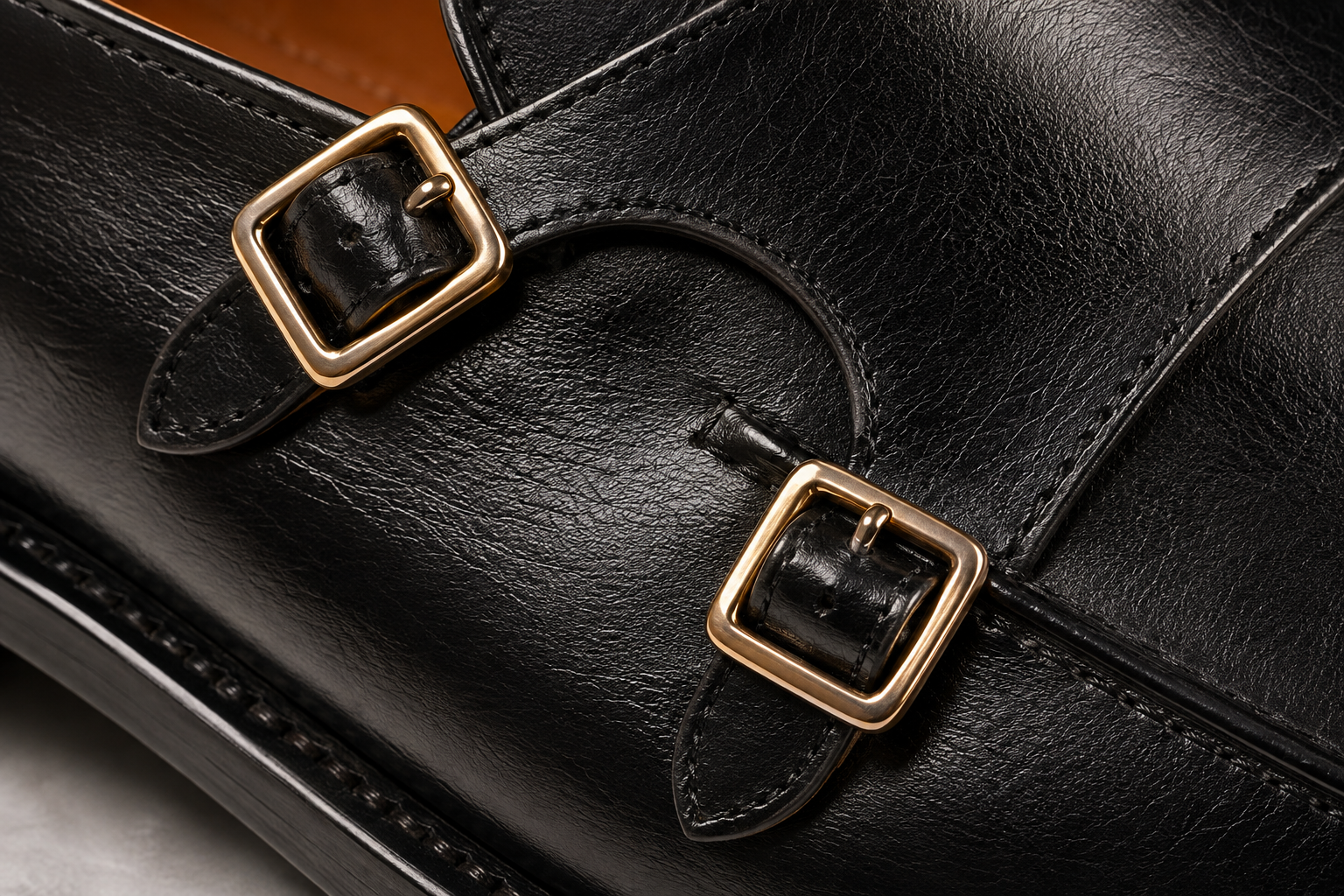 Twin antique-brass buckles side macro