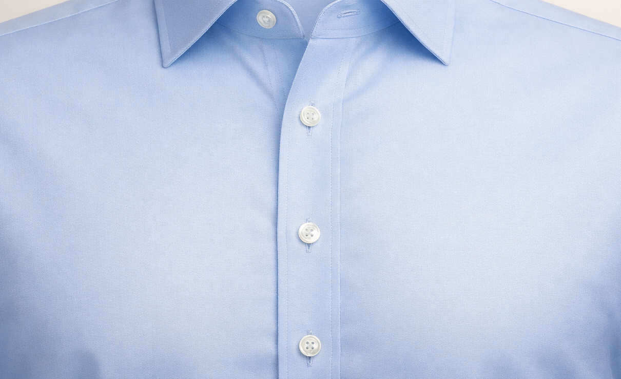 Front placket shirt with visible folded strip along the button line — the standard shirt front style