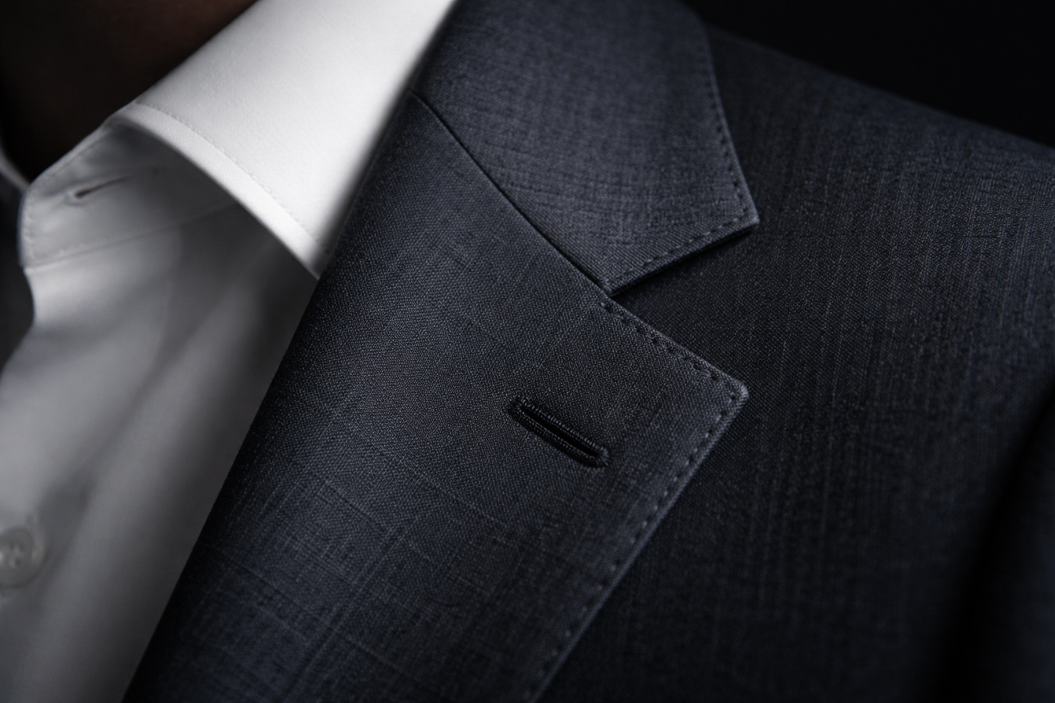 Notch lapel suit style showing the V-shaped notch where lapel meets collar — the most versatile and classic choice