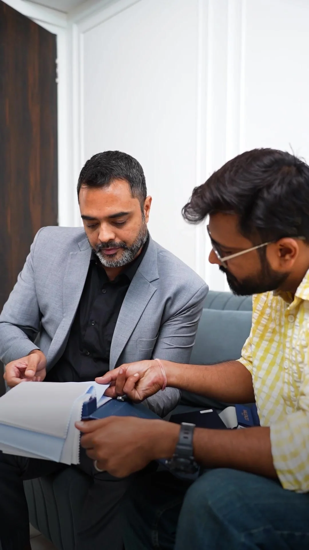 Saptadeep, founder of Turn & River Bespoke, in his own bespoke grey jacket