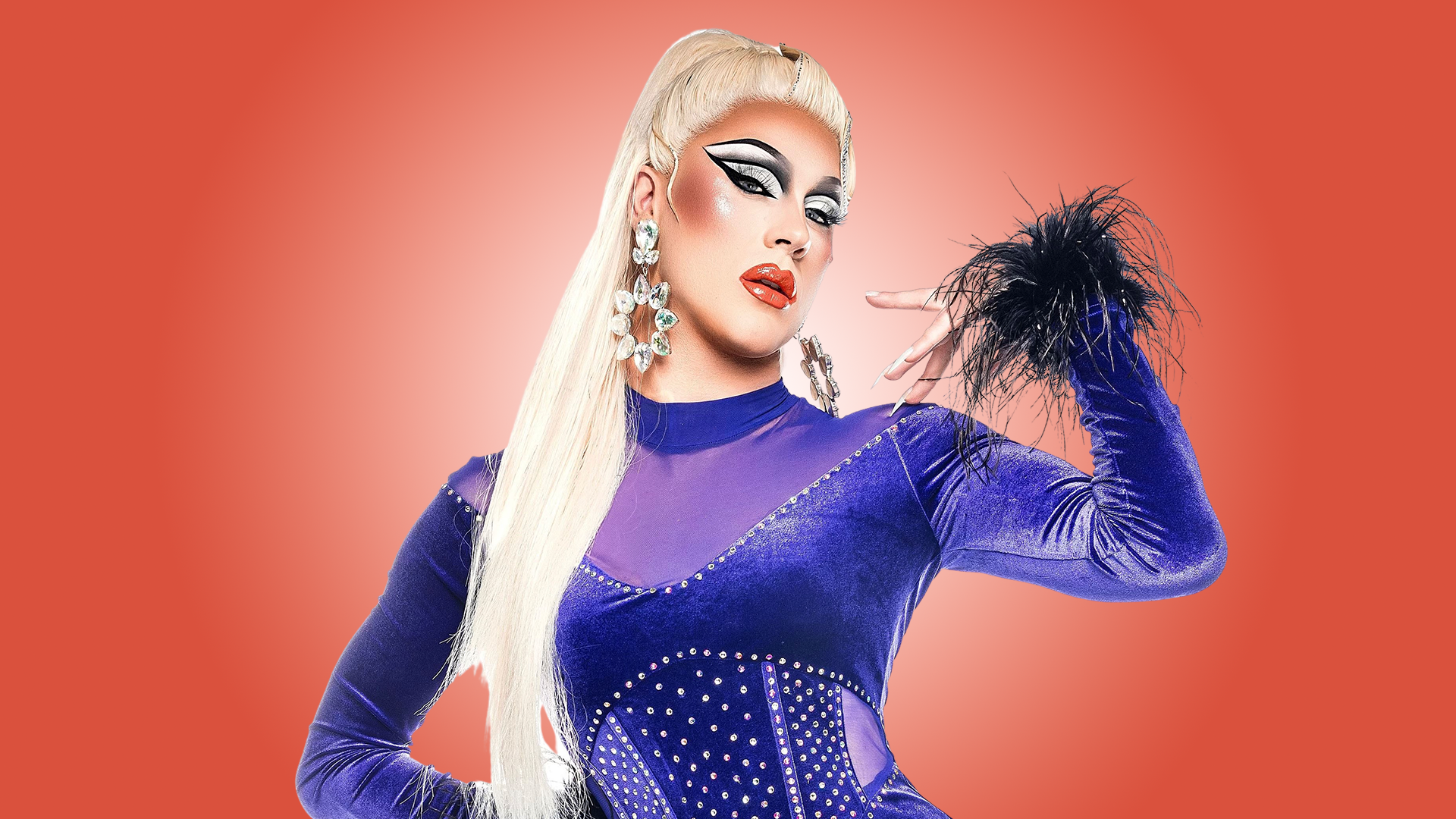 Fairah Nuff with a platinum ponytail, wearing a purple velvet costume with a black feather cuff and her arm raised