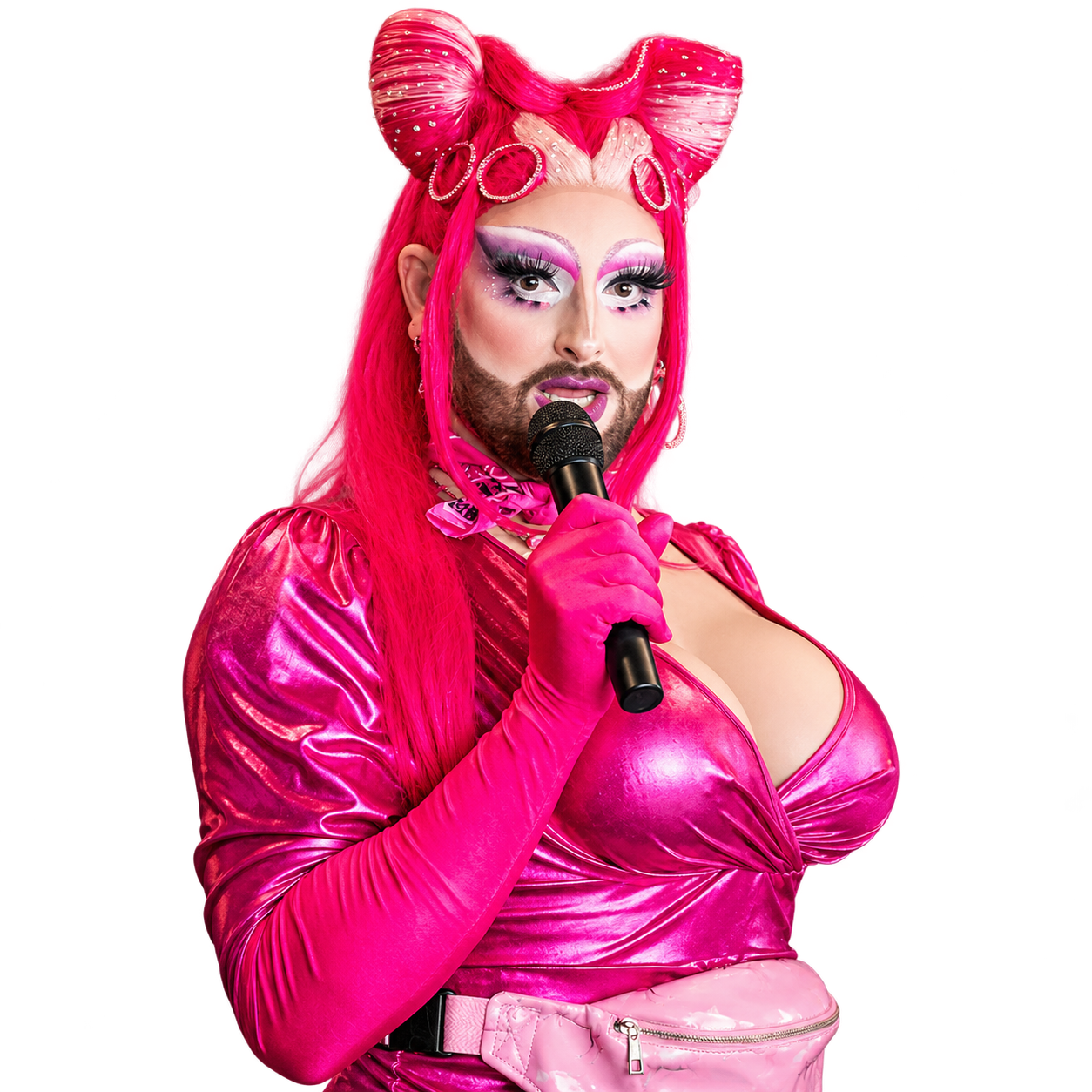 Jackie Daniels in a vivid pink look, holding a microphone