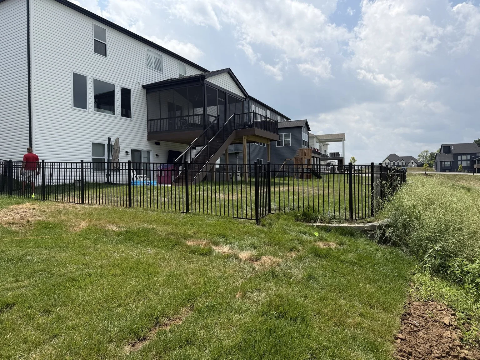 Four-foot three-rail Independence Aluminum fence installed at a Wentzville home