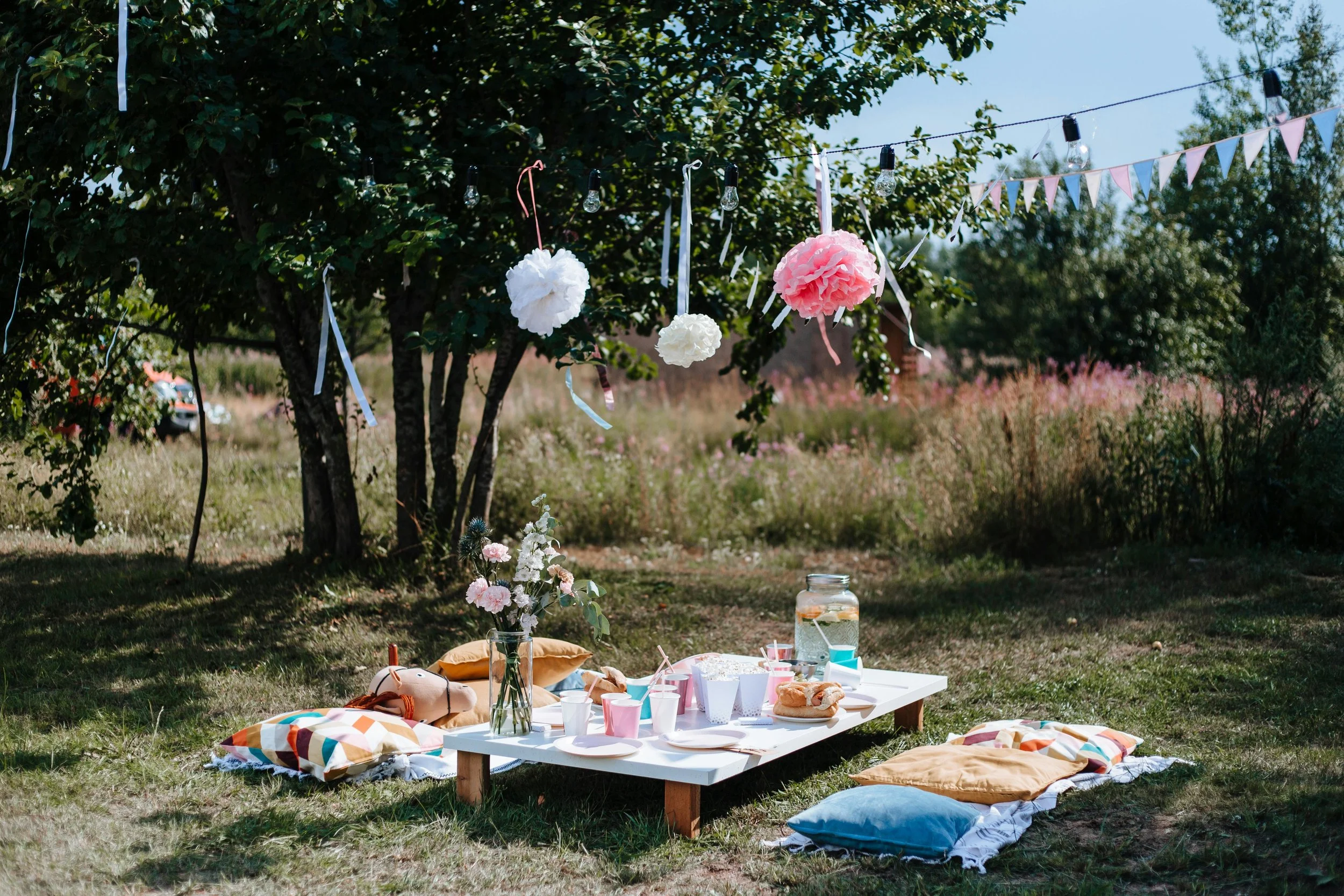 Styled hosting table with drinks and food