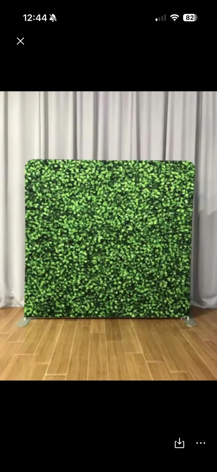 Greenery backdrop design reference with a leafy green pattern.