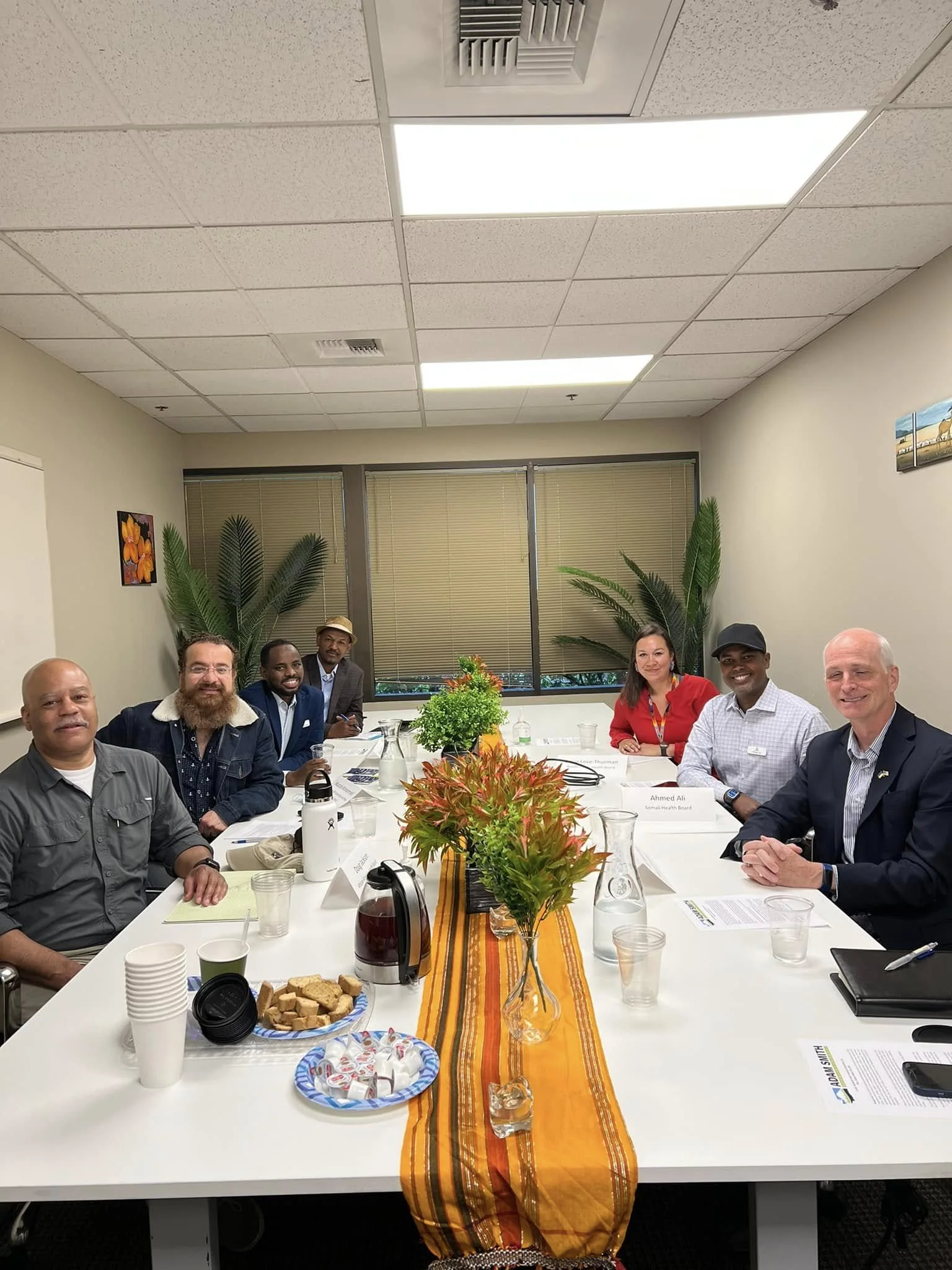 Mohamed Shidane with Congressman Adam Smith and community leaders
