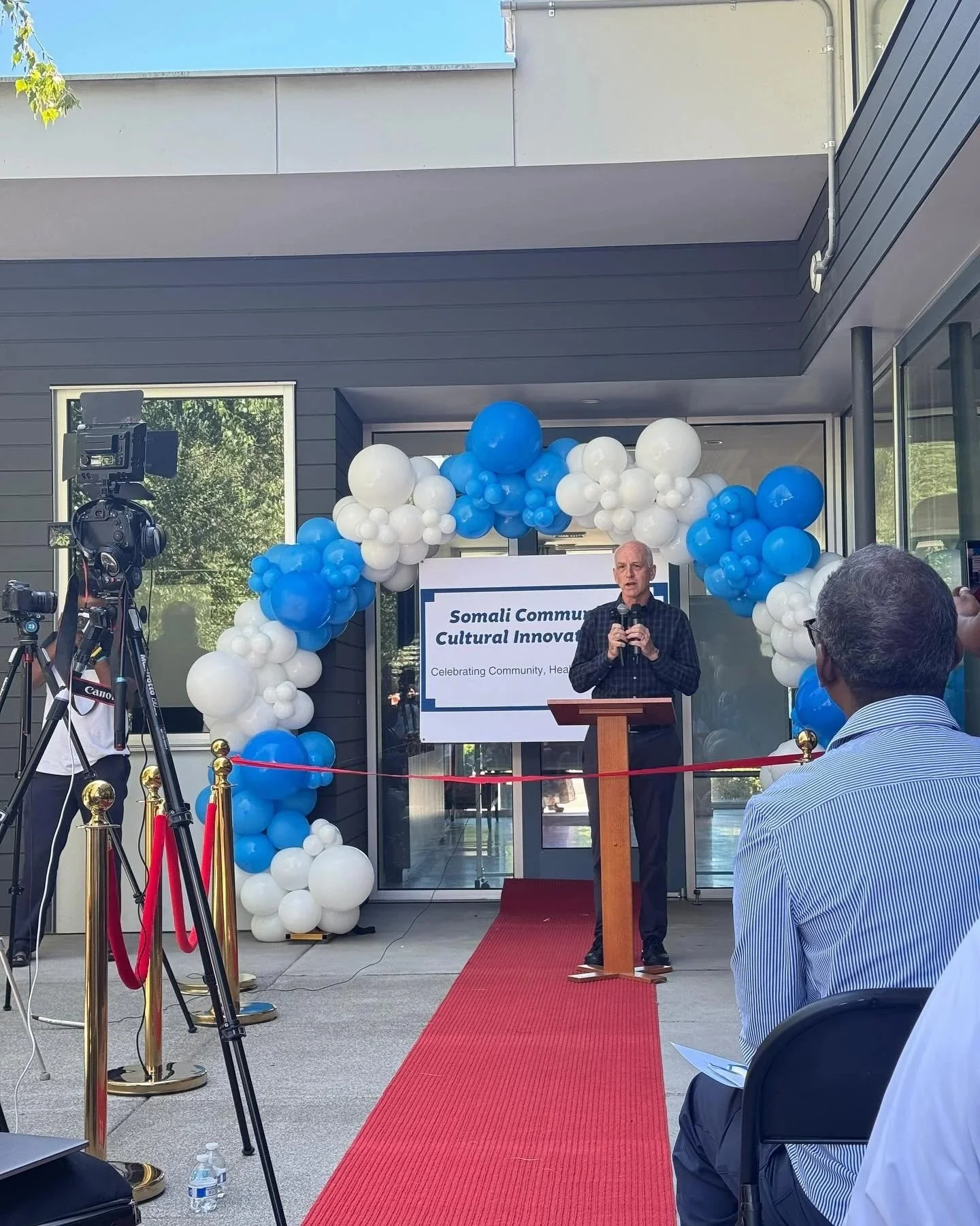 Congressman Adam Smith joins the ribbon cutting for the first community-owned Somali space in King County