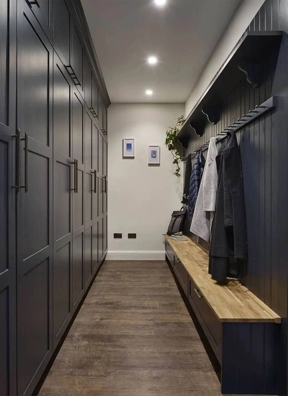 Boot room with cabinetry for coats and shoes