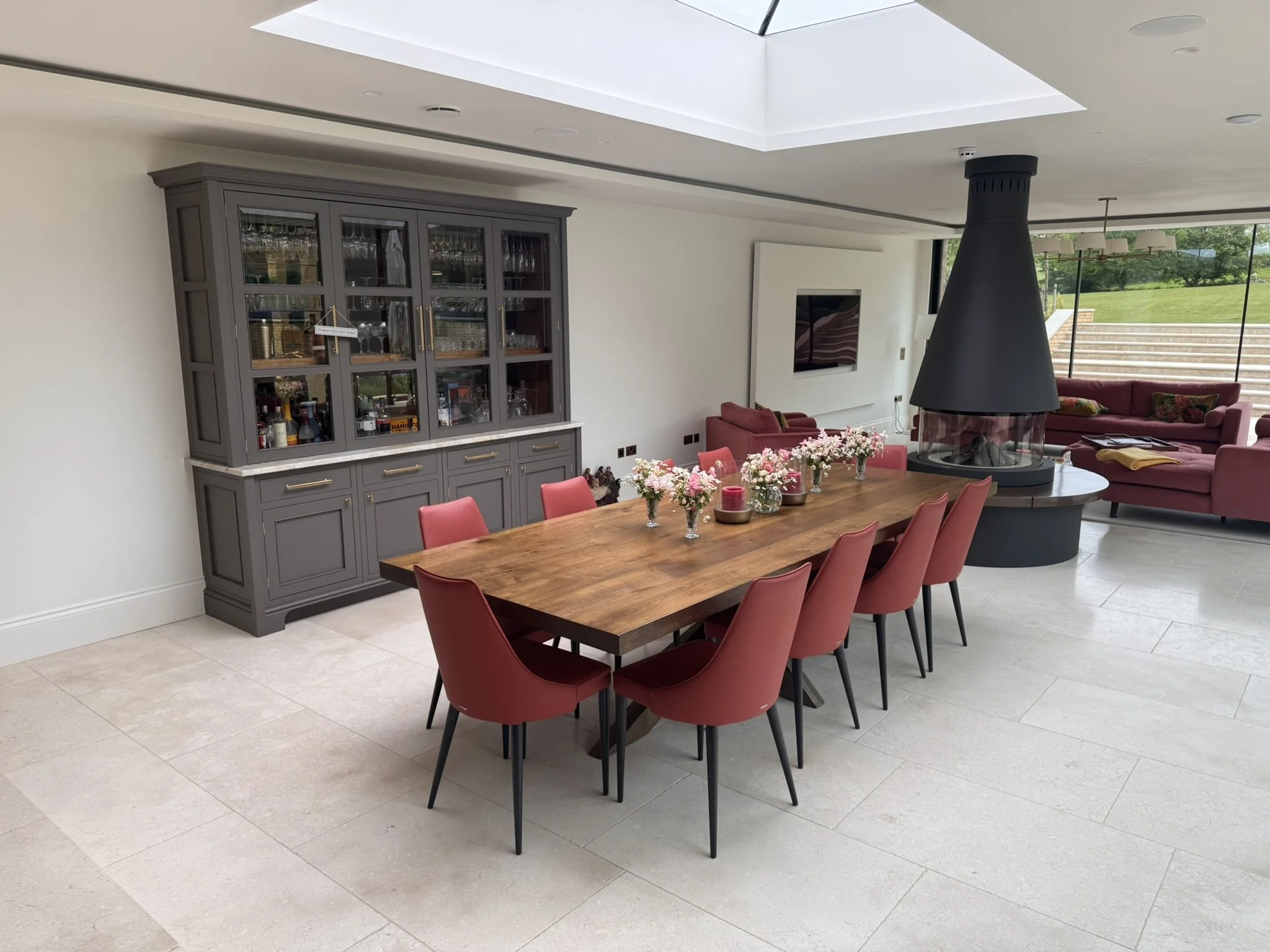 Open-plan living space with bar or media wall cabinetry