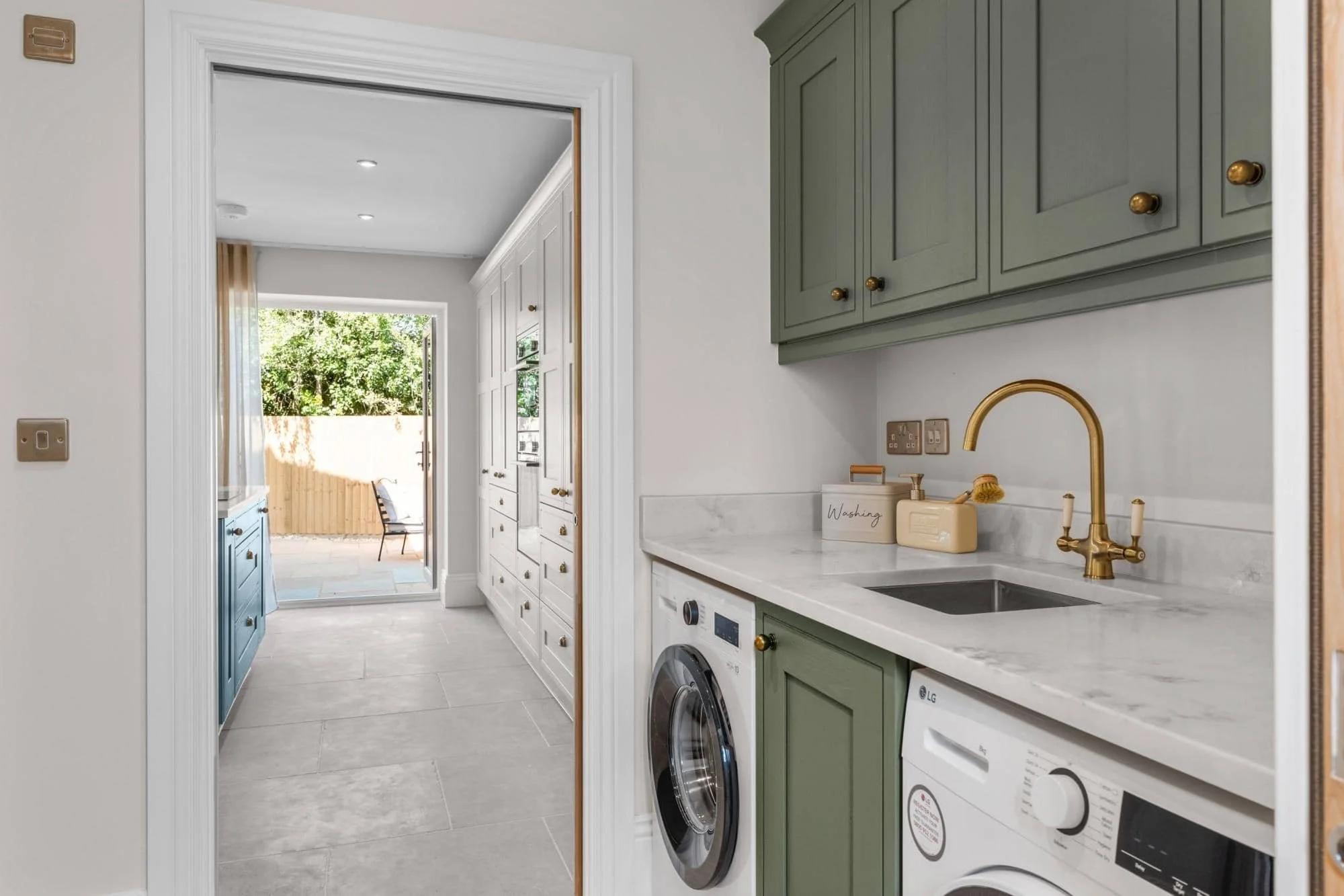 Utility room with finishes connected to the wider home