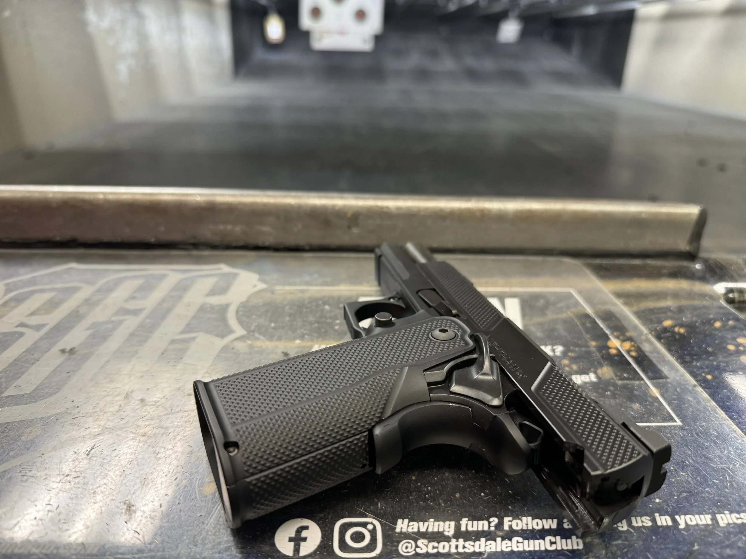Shooting the Nighthawk at the range on transfer day
