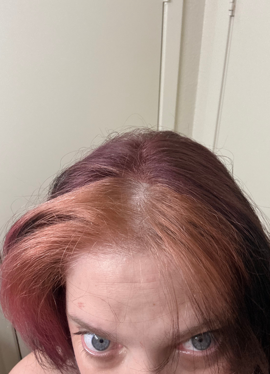 Nikki at the April 2026 styled shoot during the cherry cola hair process