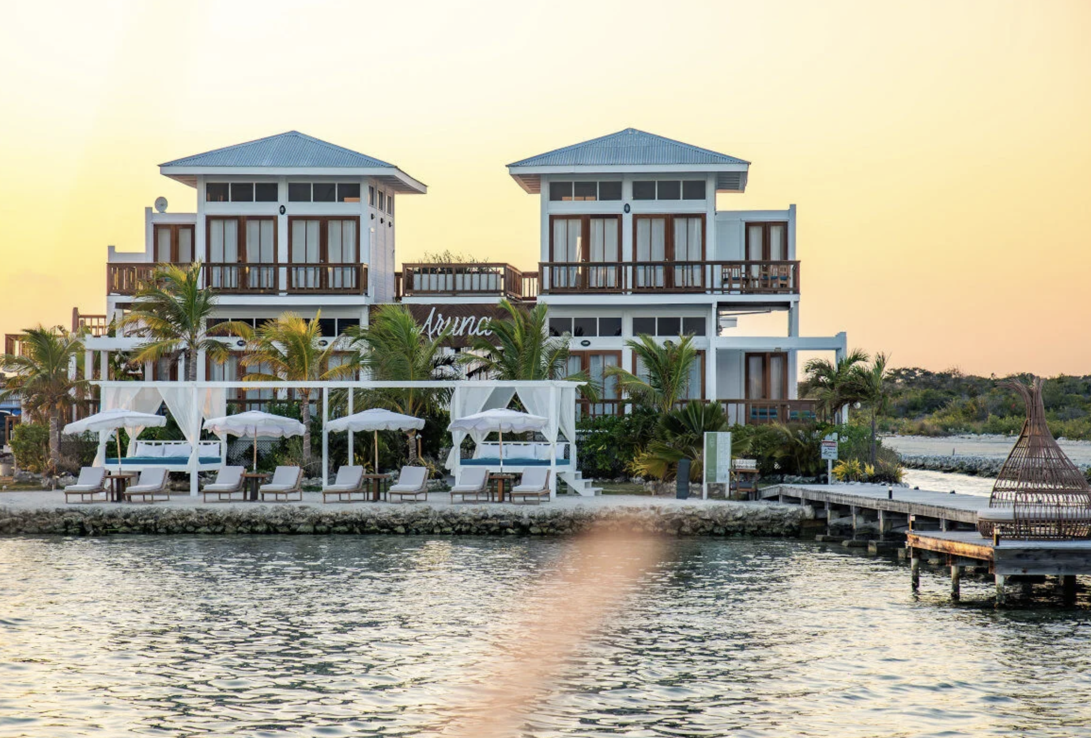 Private island resort in Belize at sunset