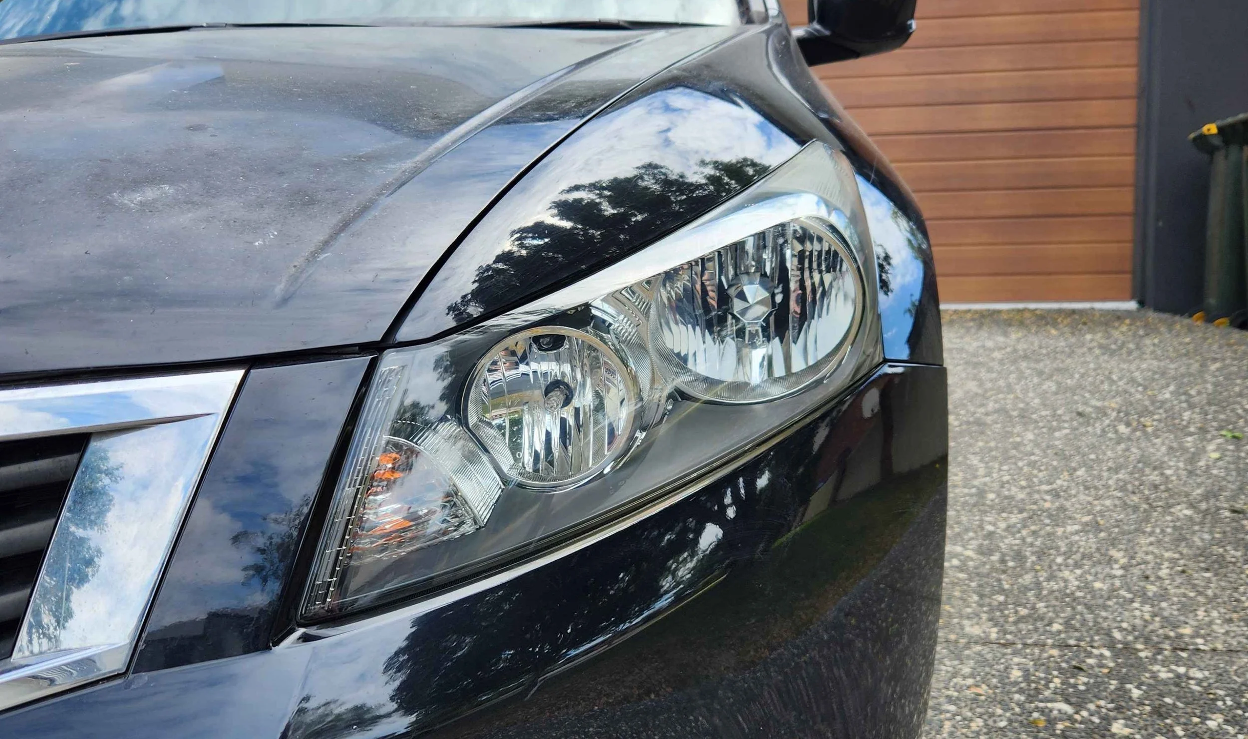 Headlight after Prestige Cleaning restoration — crystal clear
