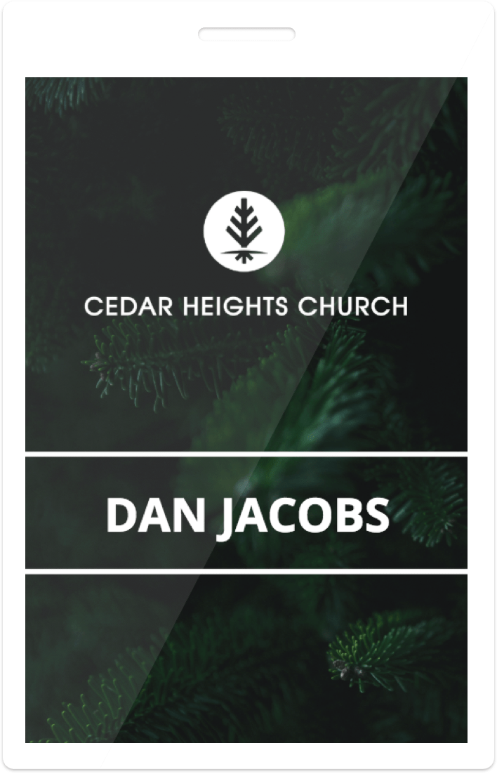Cardboard-style badge with evergreen forest background and natural earthy tones