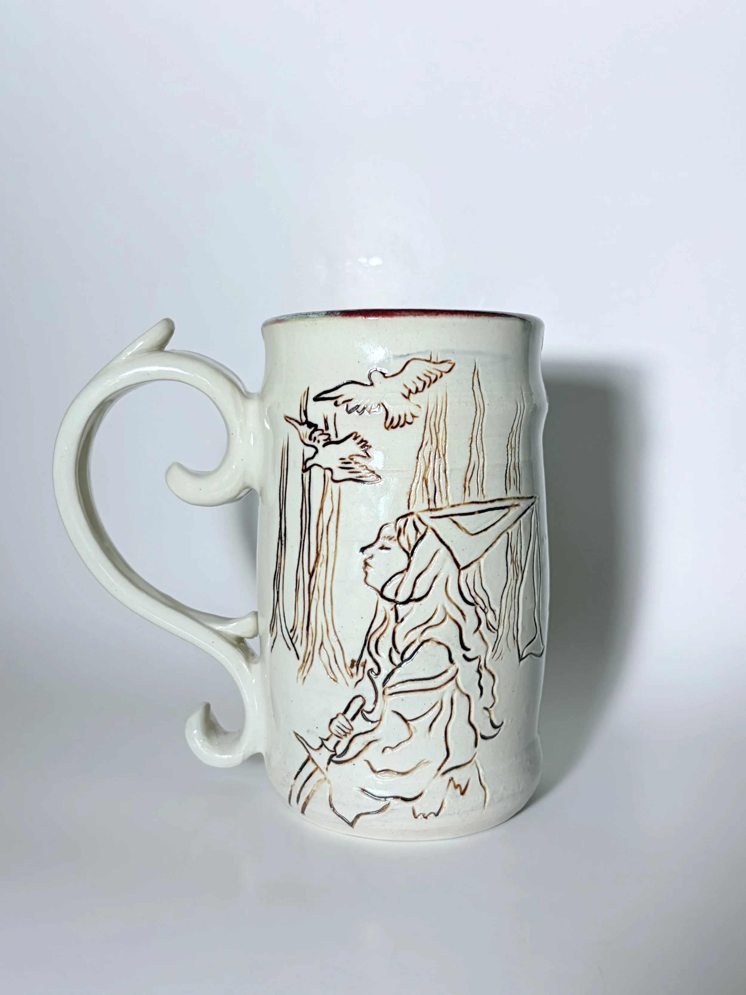 White ceramic mug with a detailed hand-painted natural-world illustration by Natalie Dahl