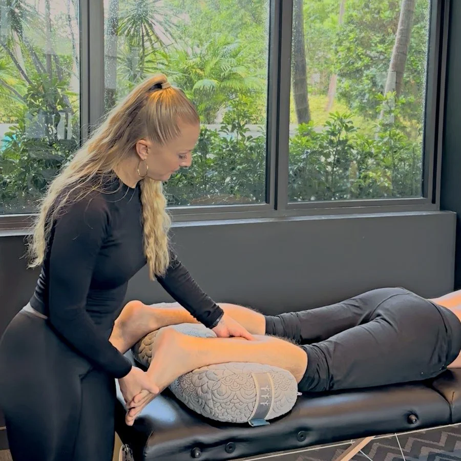 Dr. Karla Kane performing hands-on calf release on a patient