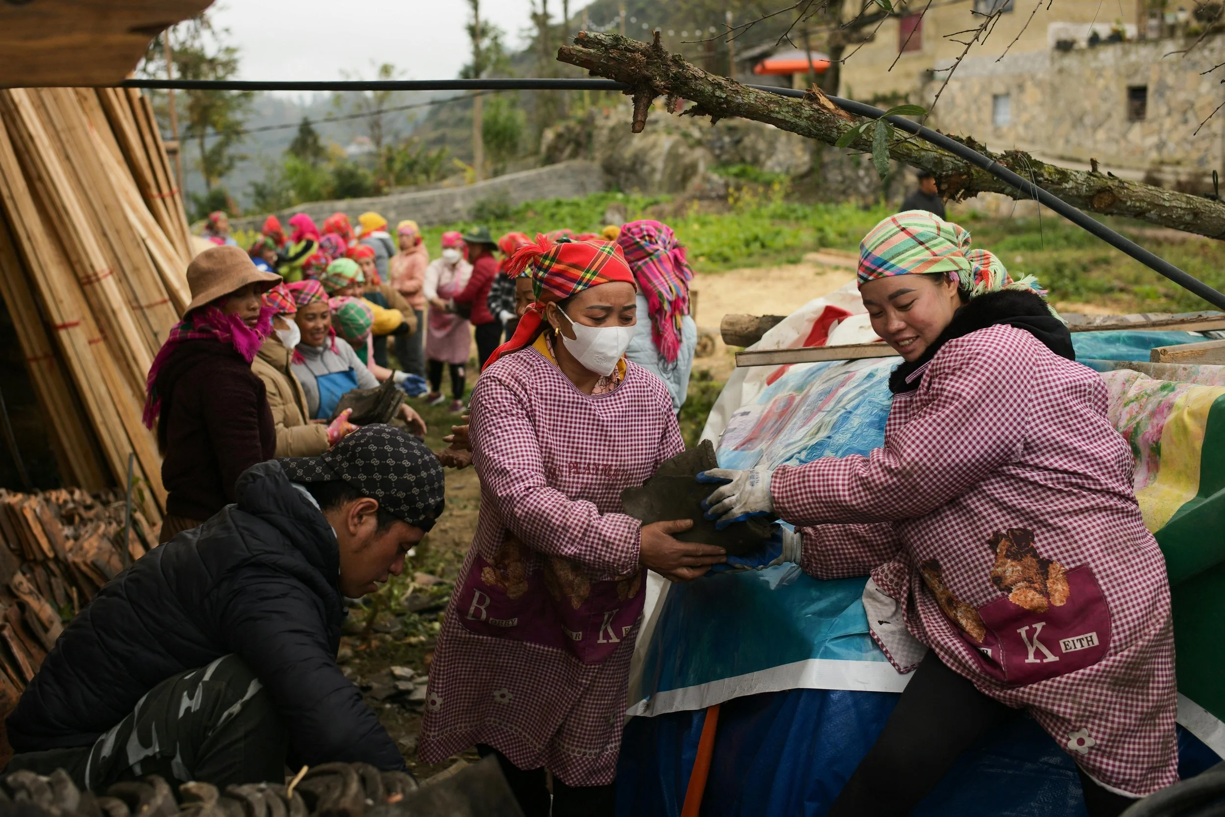 Community members working together — TDG Impact Global field operations