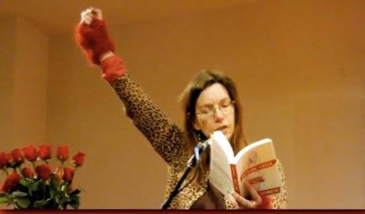 Jana at a microphone