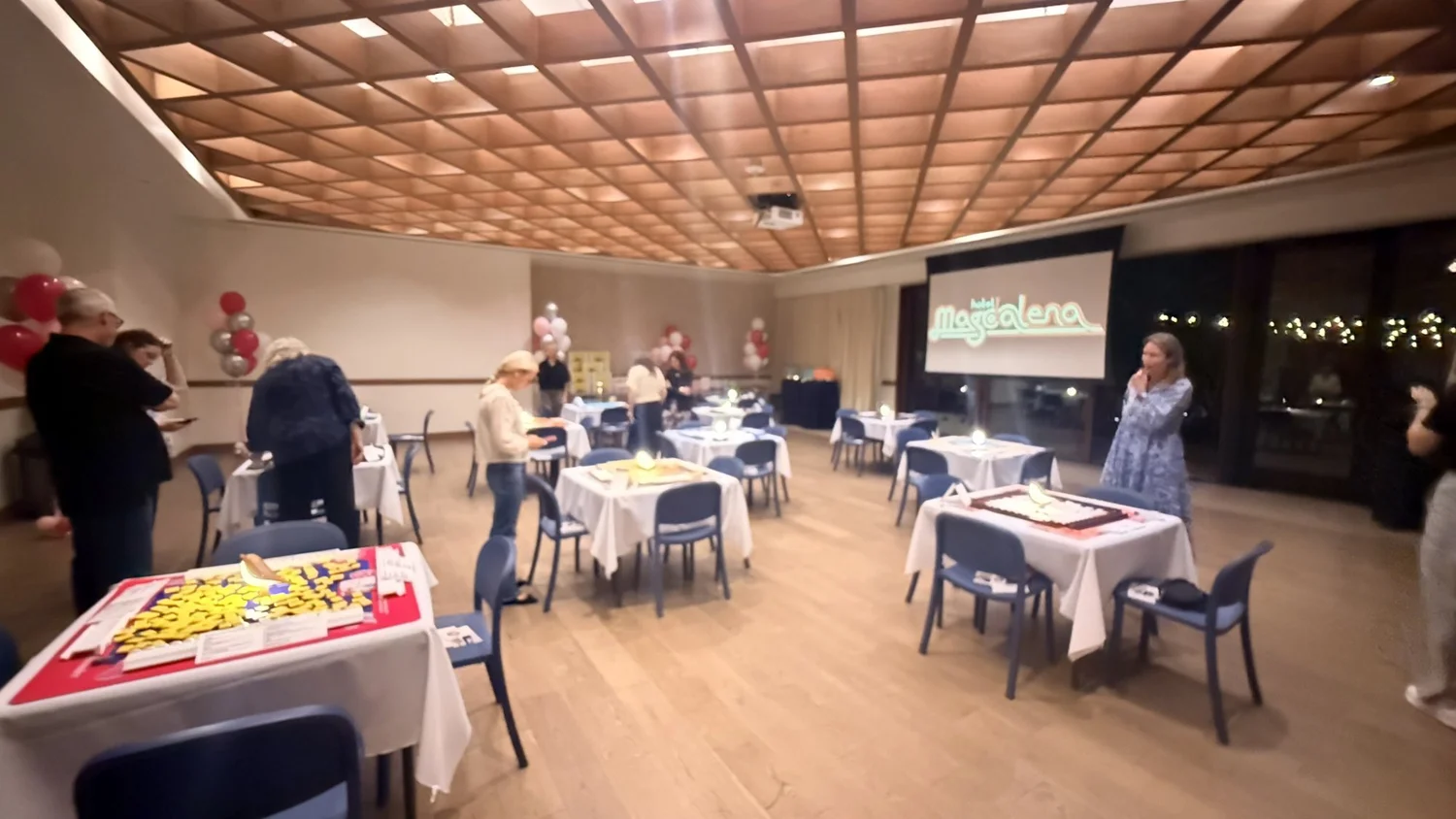 A large event room set with mahjong tables for an itsaMahjing event at Hotel Magdalena in Austin