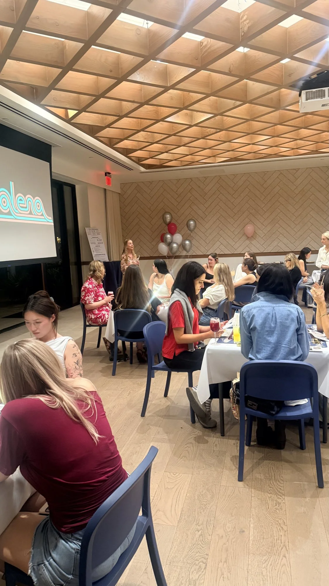 Guests playing and learning mahjong at an itsaMahjing event at Hotel Magdalena in Austin