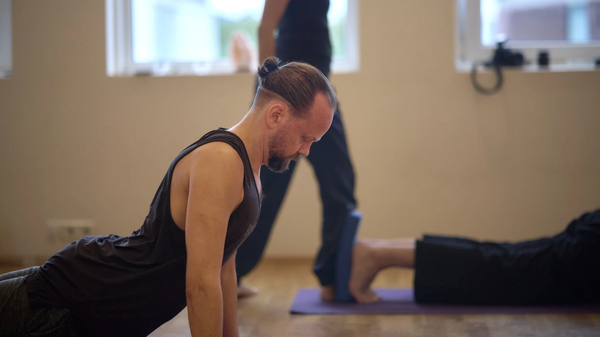 Gestur practising yoga at Art of Yoga in Reykjavík