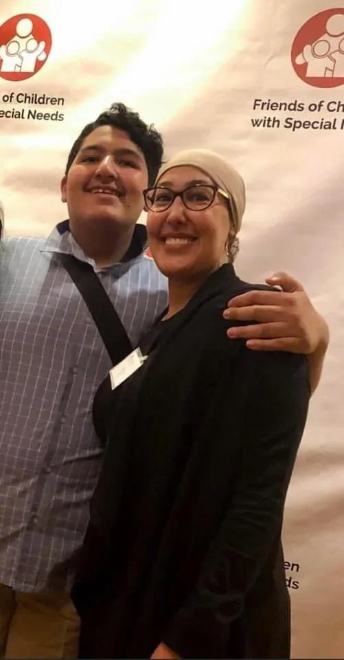  Mu and Feda at a fundraiser earlier this year. 