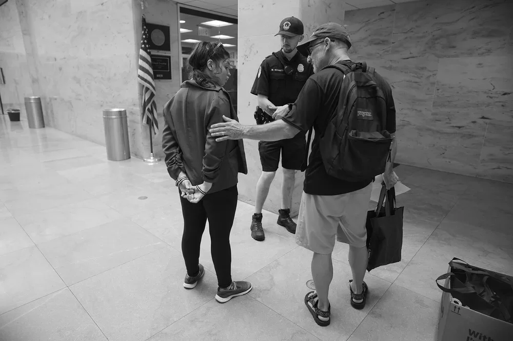 Jim Rich reassures Jadyne that the officers with stickers are just ahead.
