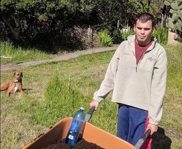  Thomas at work at Common Roots Farm in Santa Cruz, California. 