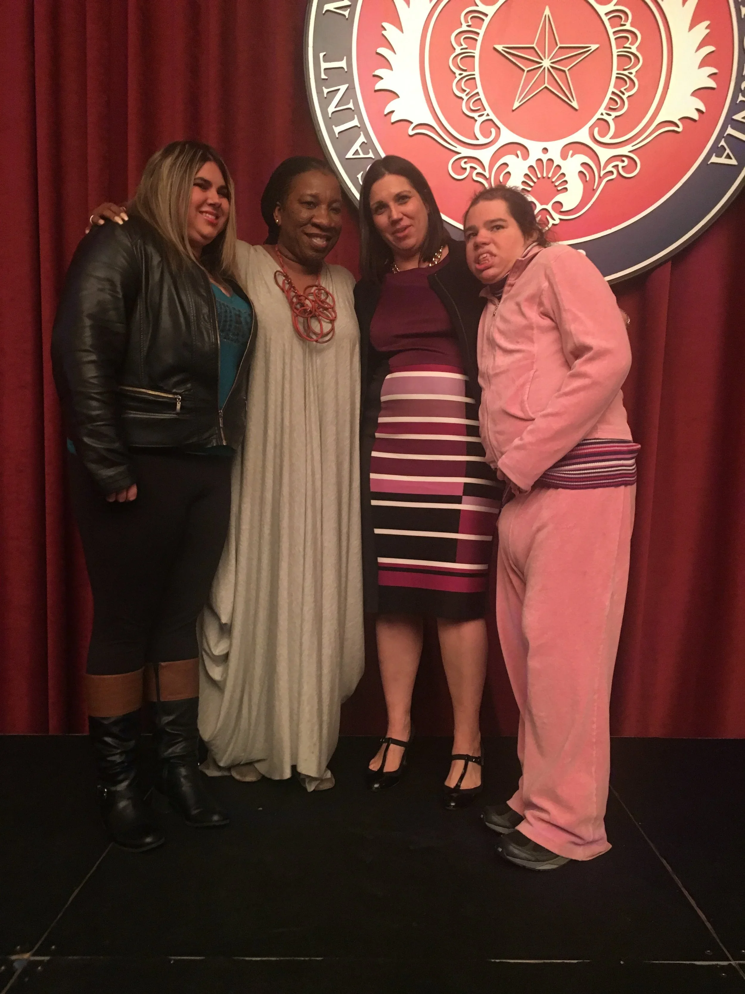  Neward with Tarana Burke, founder of the #MeToo movement, and her sisters Patricia (left) and Natalie (right). 